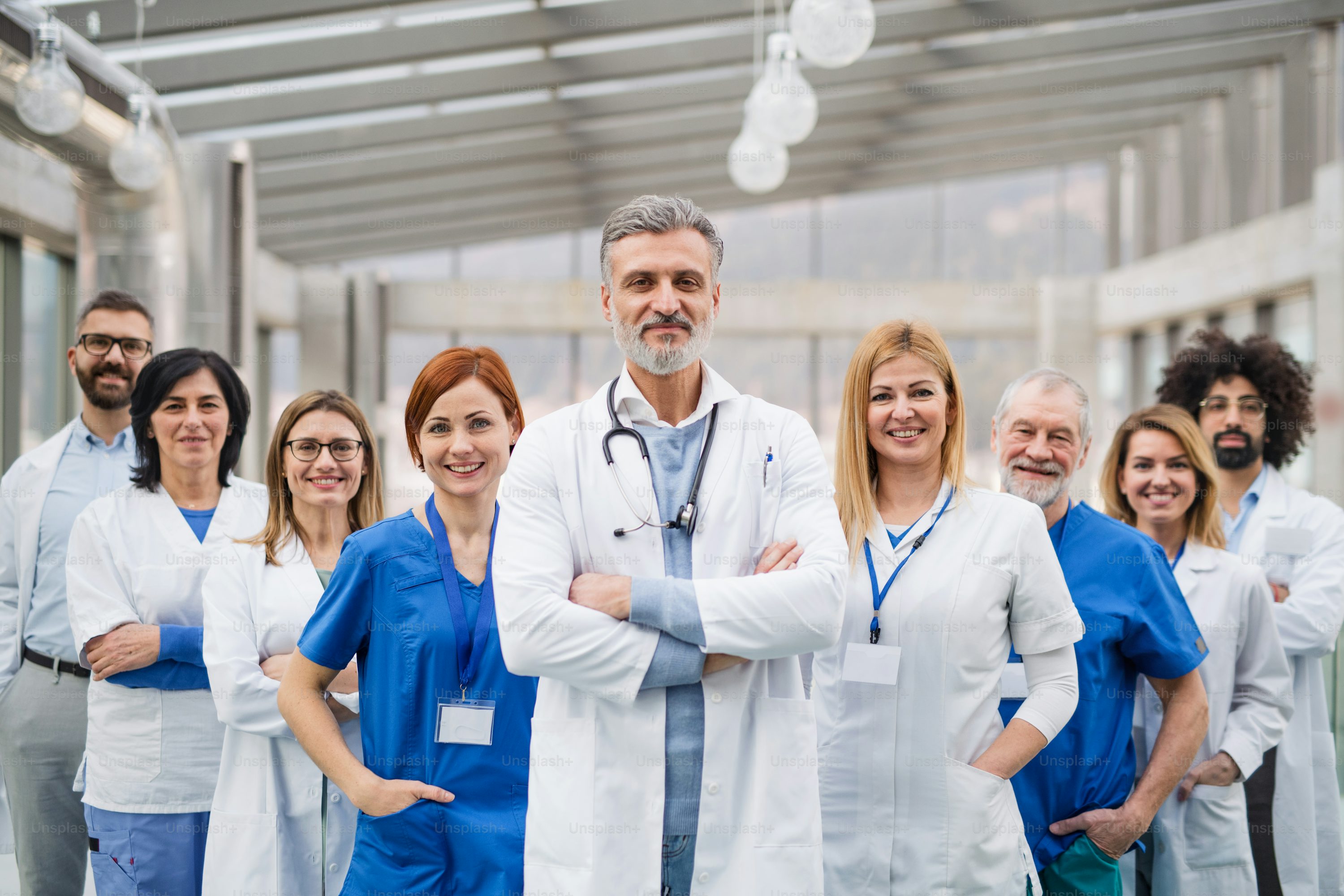 Healthcare professionals discussing vendor solutions in a hospital conference room